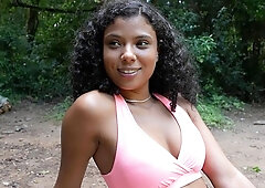 Curly-haired hottie Nathy Oliveira nicely plays with her shaved pussy