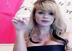 Blond shemale caresses her cute little feminine cock for you