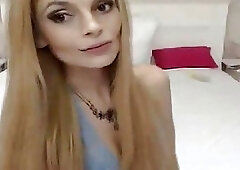 Kinky blonde Tbabe in stockings tugs her dick on webcam