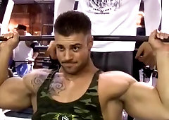 Inked Steve pumping and flexing