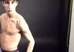 Curly twink boy shows off his slim body on webcam