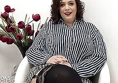 Seductive brunette hair plumper with huge breasts is using adildo whilst masturbating on live webcam