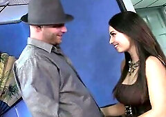 This impressive woman engaged in private relations on a leather sofa with a favourable chap.