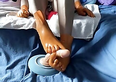Latex Sissy Gives Sextoy Footjob