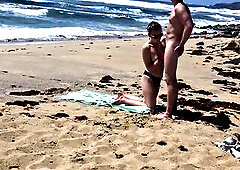 Topless tan gal gets drilled in the beach on the sand, Naemyia