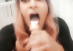 A hawt transgender crossdresser sissy sucking on a biggest vibrator and swallows cum. Awaiting for the right dude to come along and screw her face.