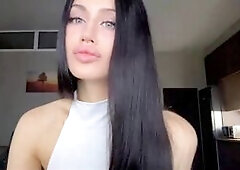 Long Hair Beauty in White Bodysuit