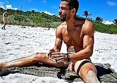 Athletic guy Andrearmani shows off his smooth bubble butt while doing nude yoga at a Rio beach