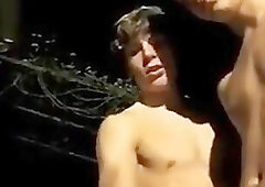 Hot boy getting help from a friend