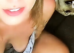 Small-titted chick flashes her shaved pussy and jerks off during a downblouse broadcast