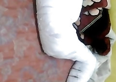 A person is tied up and wrapped like a mummy