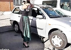 DIRNDL WENCH GETS IMMODEST AND OILY CHANGING TIRES