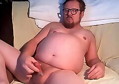 I am naked on my couch, watch me jerk off.