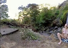 Watch hottie brunette Calliope masturbating at the waterfall