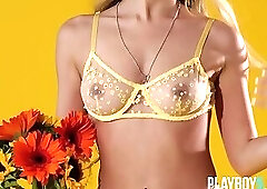 Curvy Asian teen Kelly Lu gives a sensual striptease for Playboy