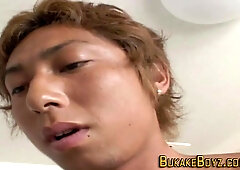 Watch this hot Chinese twink tug and stroke until she gets a cumshot facial