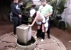 Having joy with his wife in garden infront of him