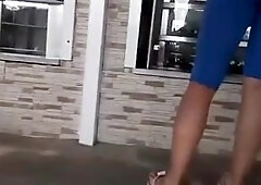 Long hair latin chick in blue spandex shorts