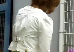 Asian doll spied while changing her skirt