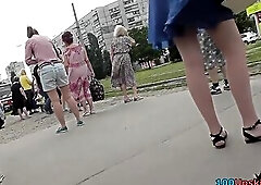 Brown haired hottie was wearing charming blue petticoat when a candid voyeur bloke filmed her precious flaccid booty.